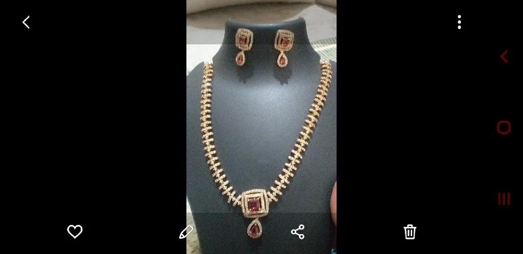 Gold Toned Necklace Set with Red Stones