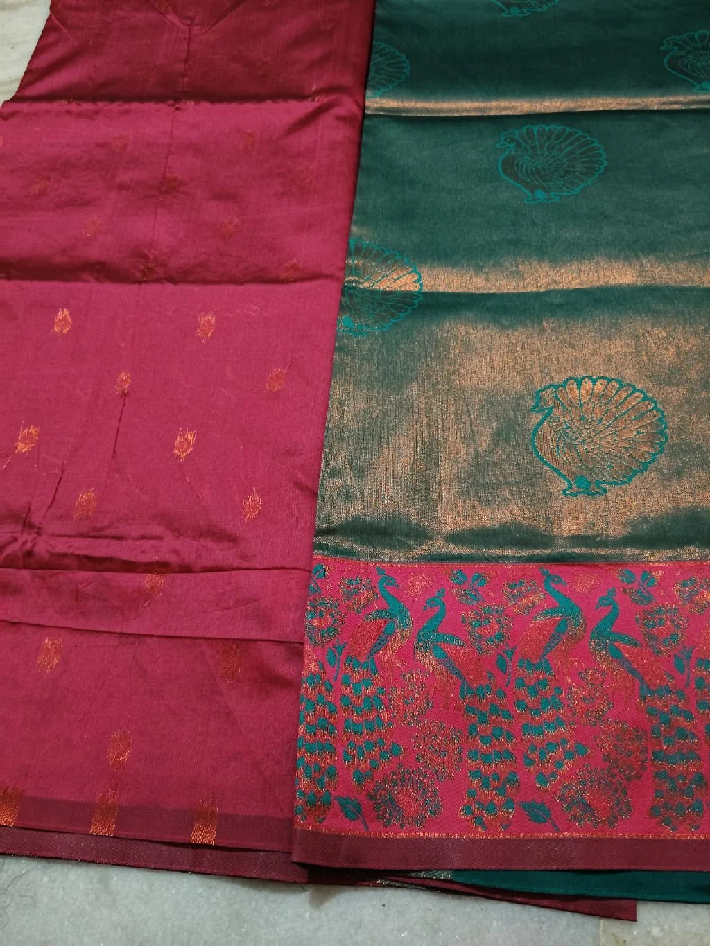 Teal and dark pink Silk Saree with Peacock Zari boarder and pink buta blouse