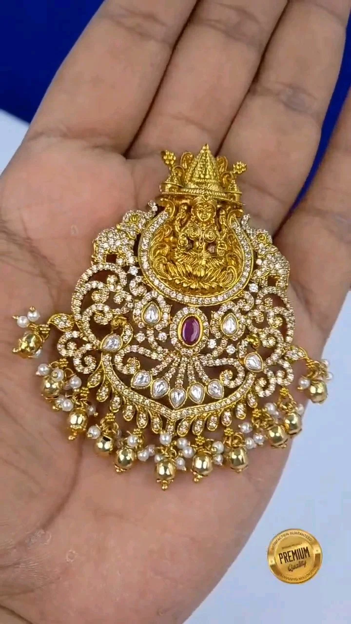 Gold Plated Lakshmi Temple Pendant with AD Stones and Pearl Drops