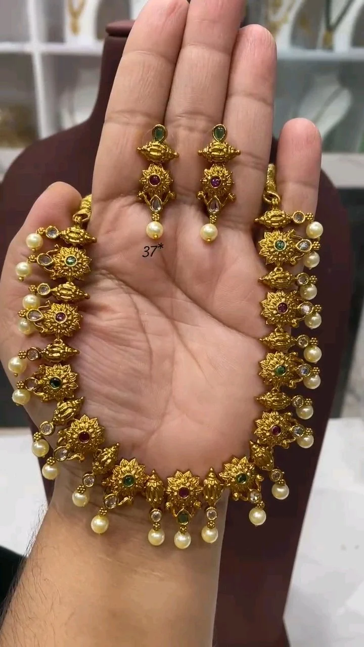 Gold Plated Floral Necklace Set with Ruby Emerald Stones and Pearl Drops