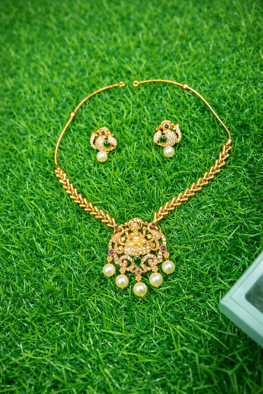 Gold Toned Lakshmi Temple Necklace with Green Pearl Drops And Earrings Best Quality