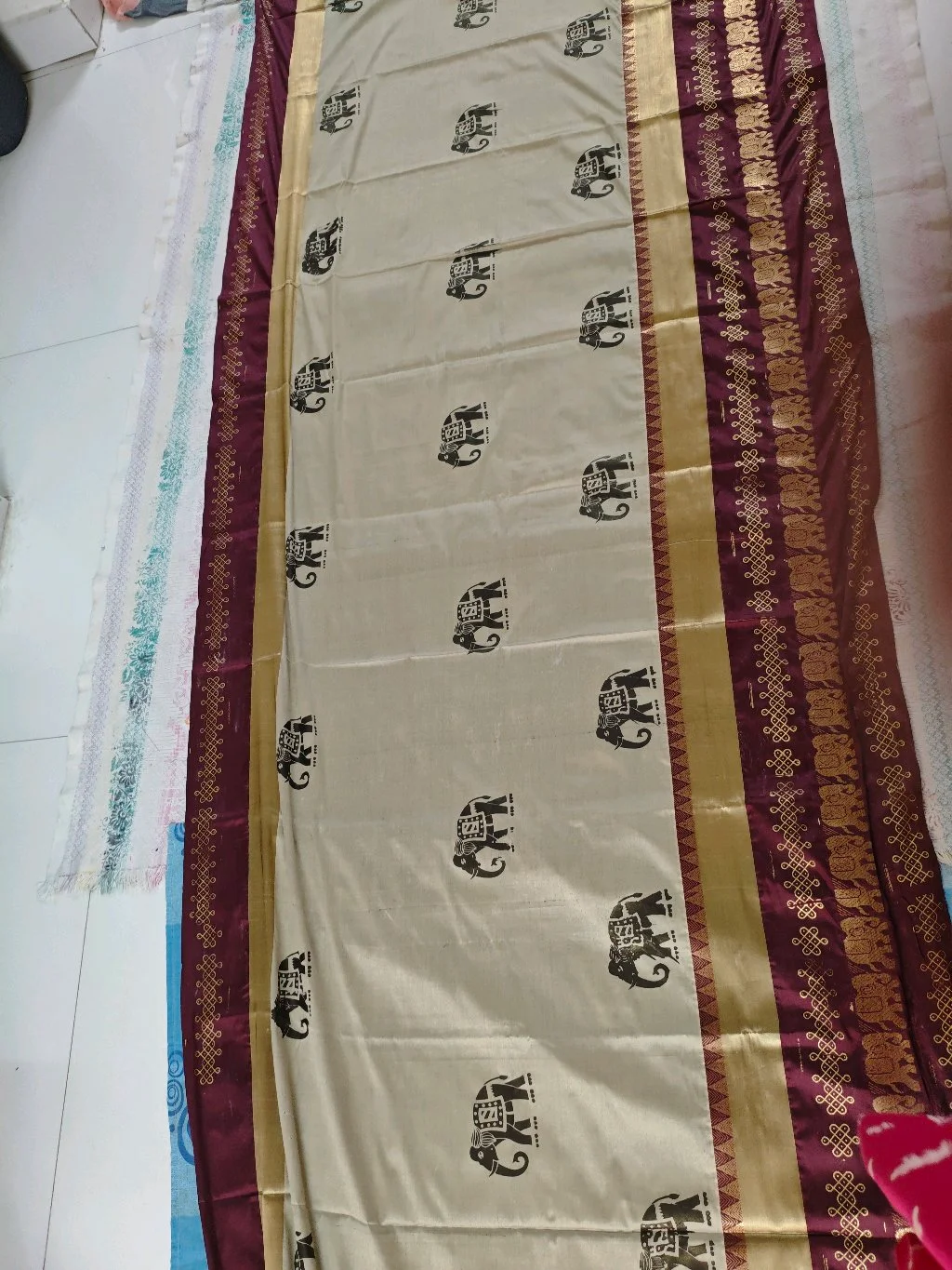 Cream Elephant Block Print Saree with Maroon Gold Zari Border