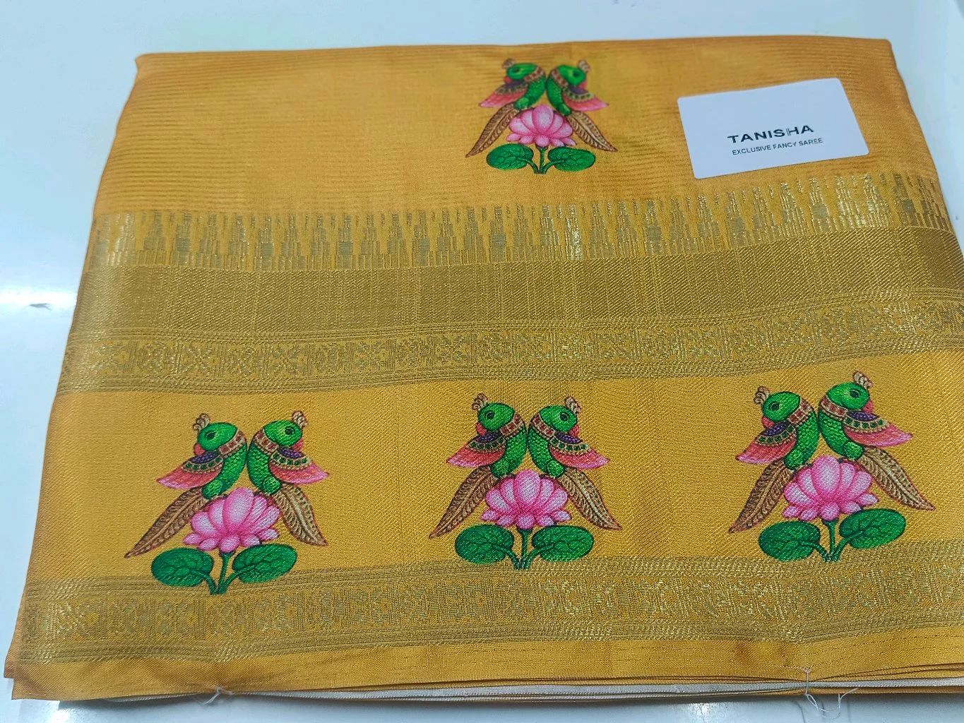 Thanjavoor Print,Tanisha Exclusive Fancy Saree with Peacock Lotus Design