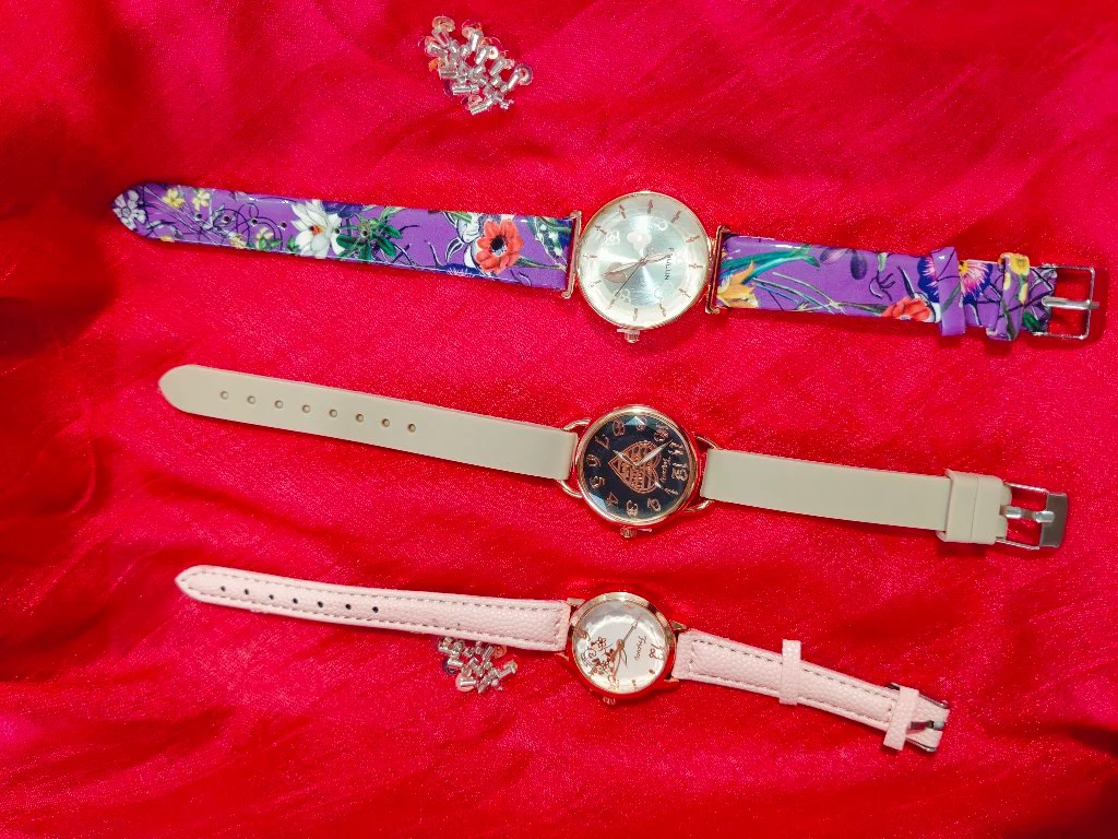 Ladies Purple Floral Strap Watch