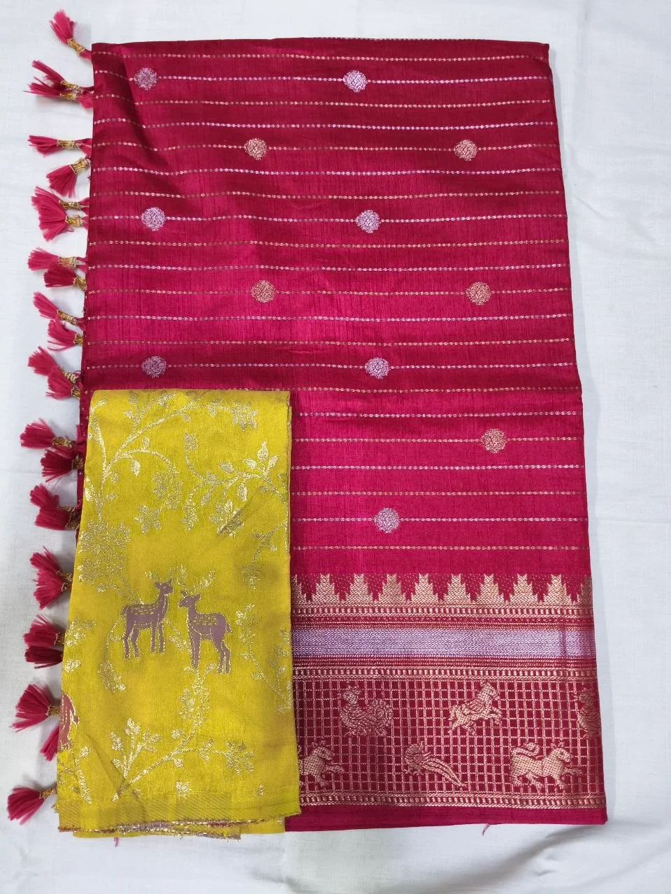 Magenta Silk Saree with Animal Motif Border and Yellow Blouse
