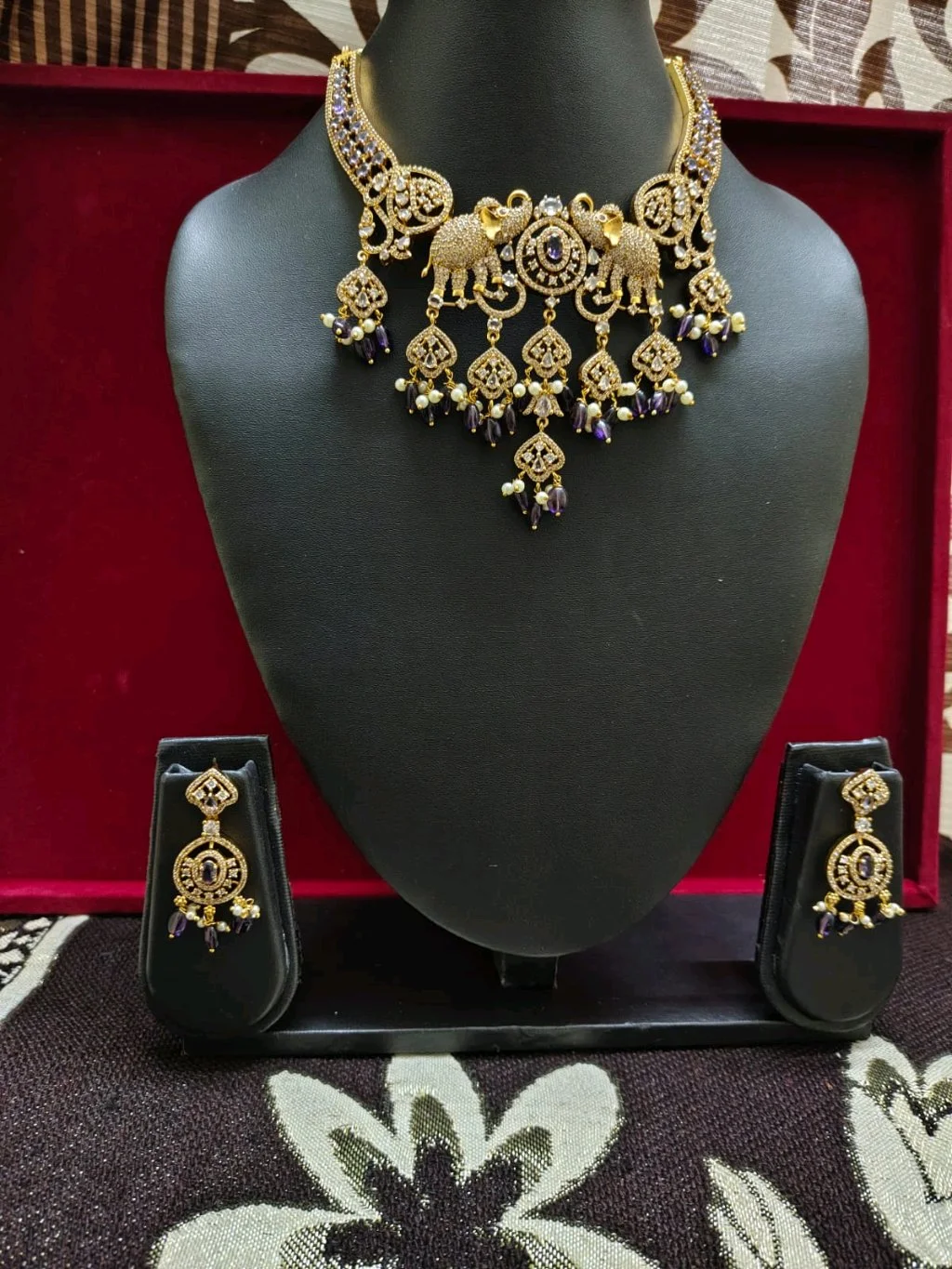 Gold Toned Elephant Motif Necklace Set with Purple Beads