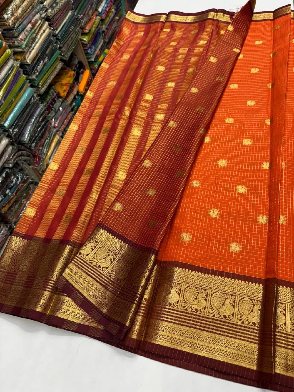 Orange Kanchipuram Semi Silk Saree with Peacock Zari Border