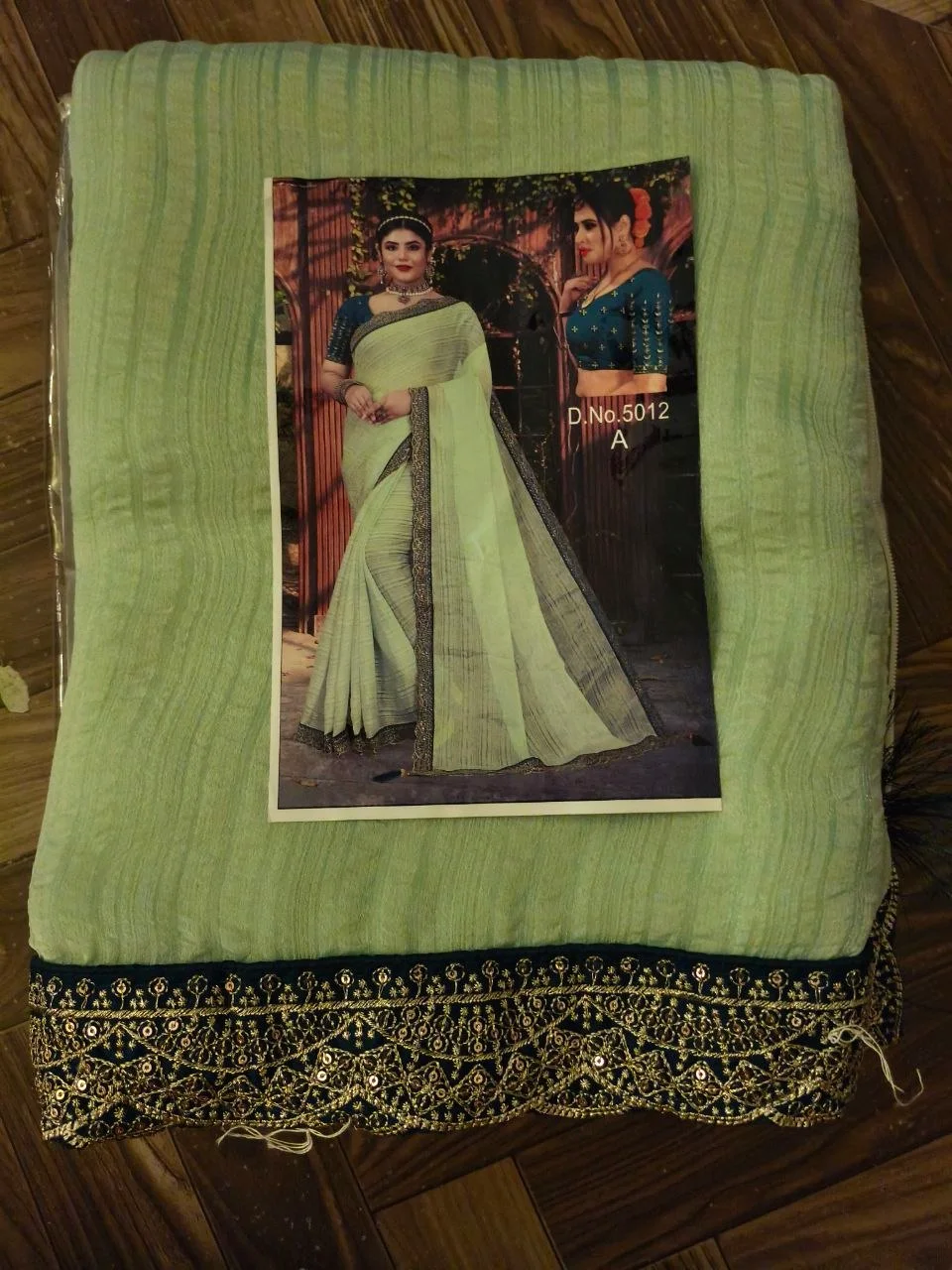 Light Green Saree with Embroidered Sequin Border 1