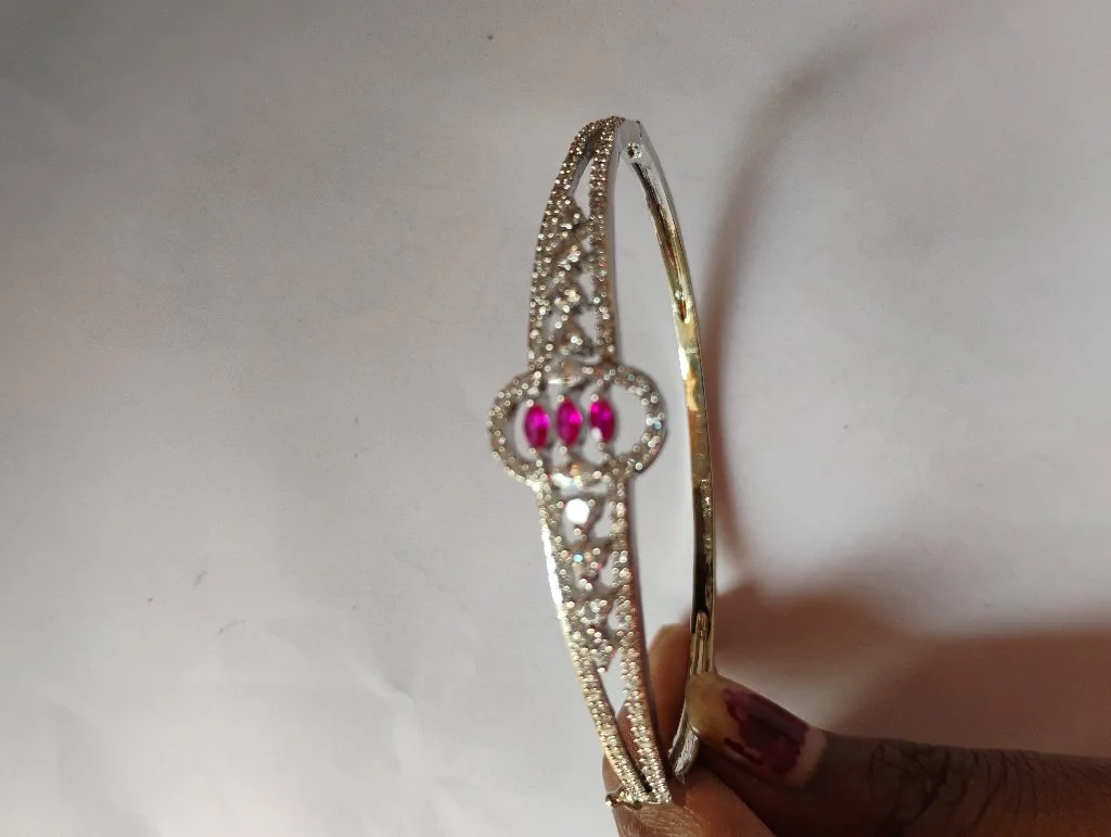Silver Toned Rhinestone Bangle with Pink Stones