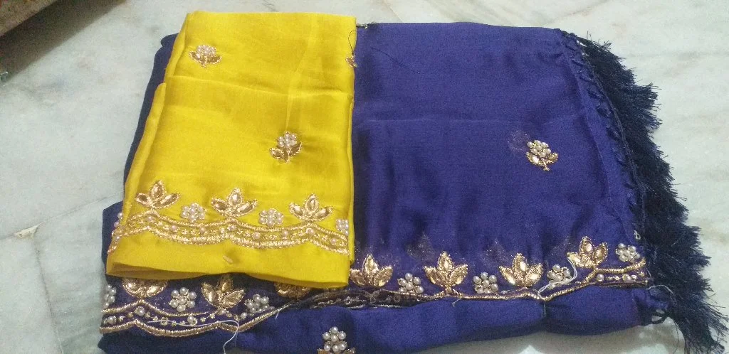 voilet color Saree with Yellow Blouse and Pearl Zari Work