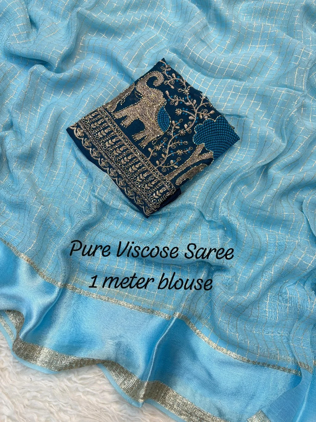 New arrivalsChex Elephant Pure viscose georgette saree with weaving Chex and satin border Saree with trending color and trending fabric with Marron color blouseBlouse of beautiful elephant beads worked with 1 meter fullRate 999 free shippingHrl