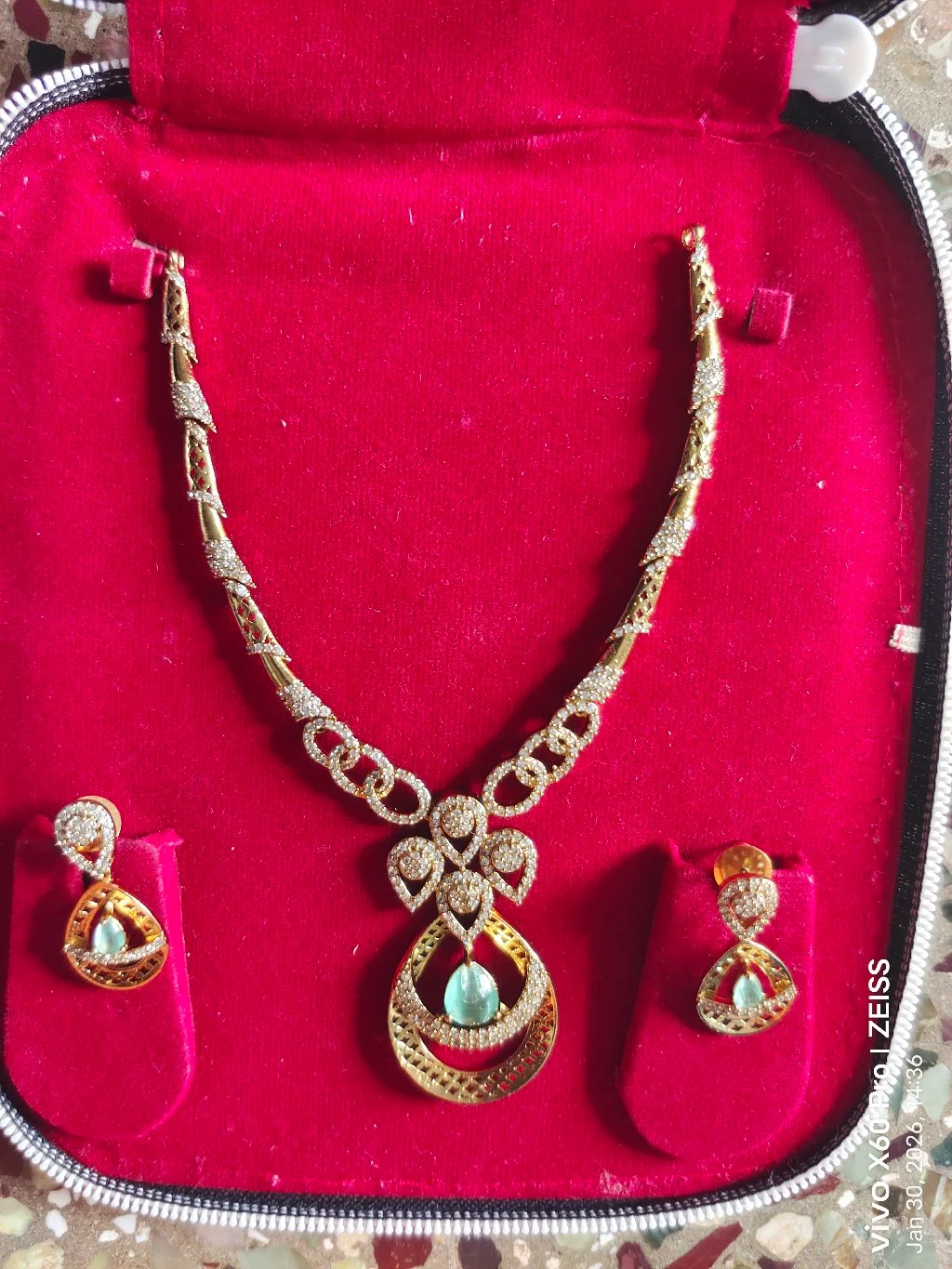 Gold Toned American Diamond Necklace Set with Green Stone