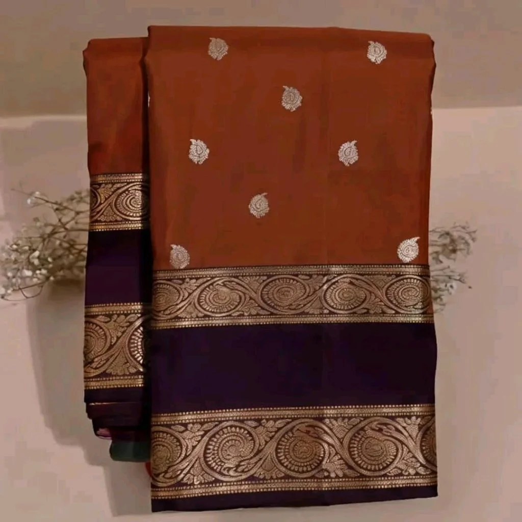 Orange Kanchipuram Silk Saree with Purple Border and Gold Zari Work 1