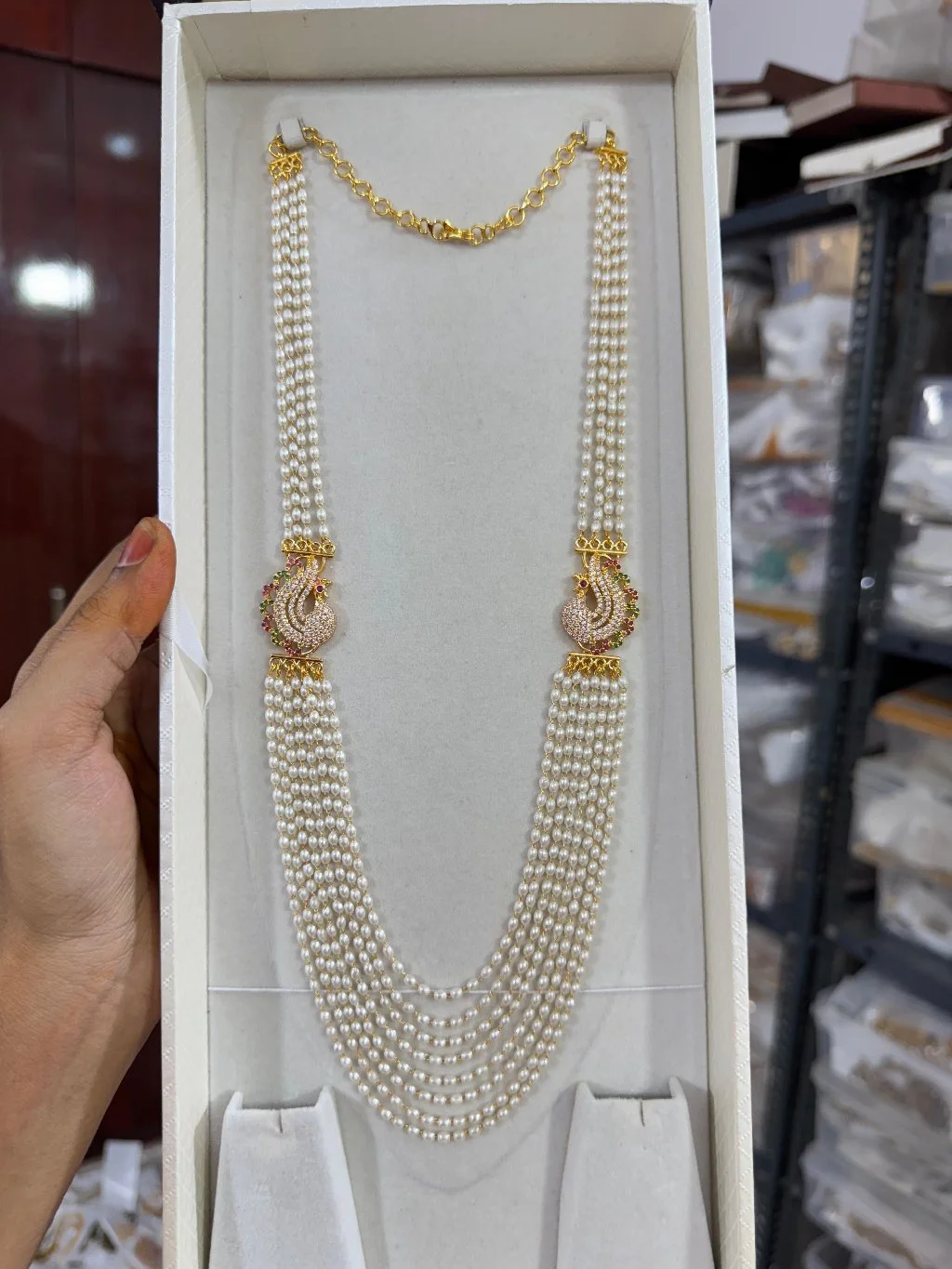 Multi Strand Pearl Long Necklace with Peacock Motifs