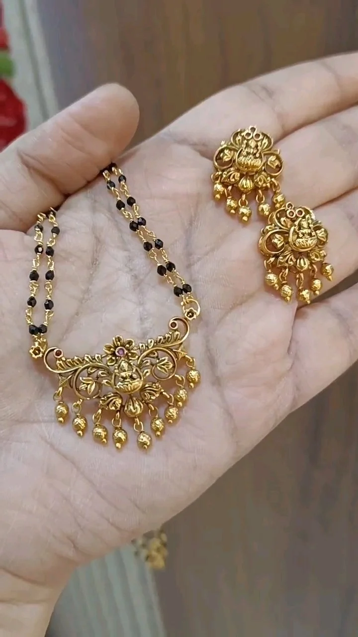 Gold Plated Black Beaded Mangalsutra with Lakshmi Pendant and Earrings