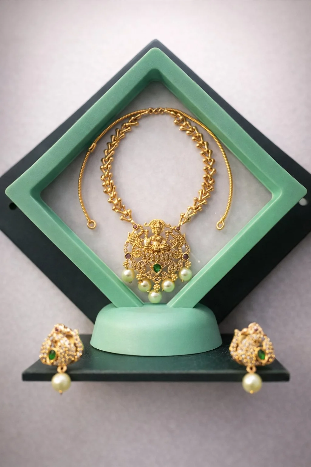 Gold Toned Lakshmi Temple Necklace with Green Pearl Drops And Earrings Best Quality 3