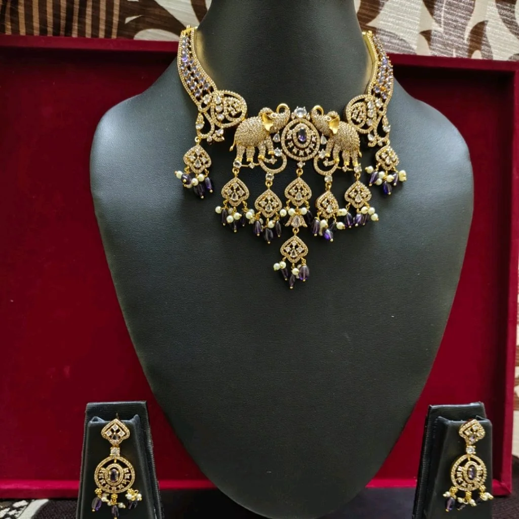 Gold Toned Elephant Motif Necklace Set with Purple Beads 2