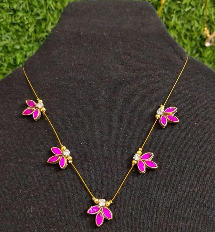 Gold Toned Invisible Chain with Pink Petal Charms