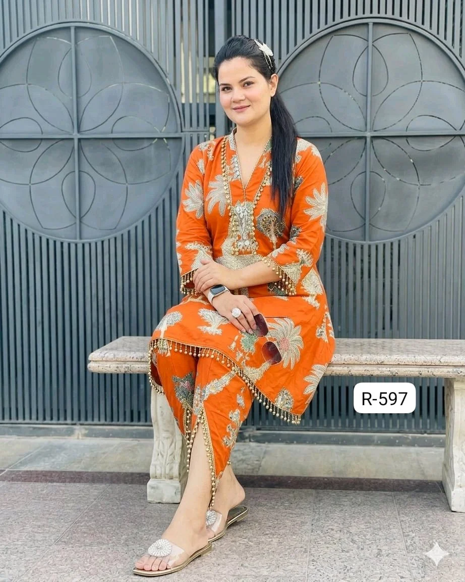 Code-R-597 FBRTulip Pants Set Highlights:• Premium pure cotton fabric• Eye-catching screen print design• Elegant gher-style kurti• Trendy tulip pants with lace finish• Designer latkan detailing on sleeves neckline hem and tulip pants• Perfect for festive, casual & day outingsColours-Orange,Yellow,Cream,Black,Blue,Red,Green,magentaQuality assured 100%Sizes-(34-44)(XS-XXL)plus sizes starts from 46-60 with extra chargePrice-1350 free shipPlus size chart and prices attached46/48-100 extra50/52-150 extra54/56-200 extra58/60-250 extraKeep shopping Keep selling 9