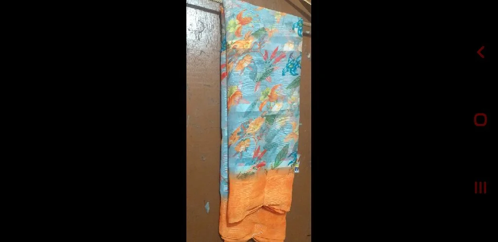 Light Blue Floral Saree with orange color blouse