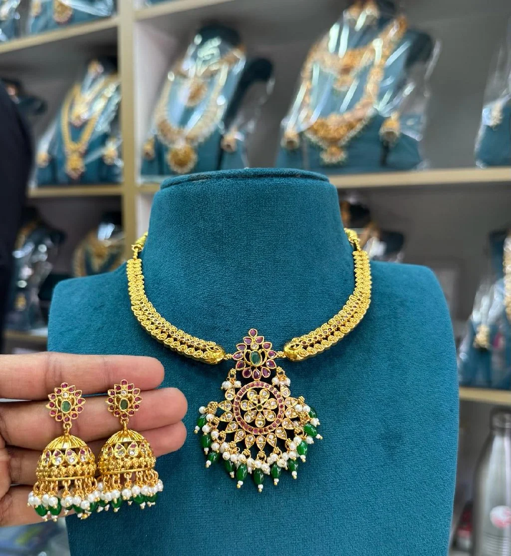 Gold Toned Temple Jewelry Necklace Set with Jhumka Earrings