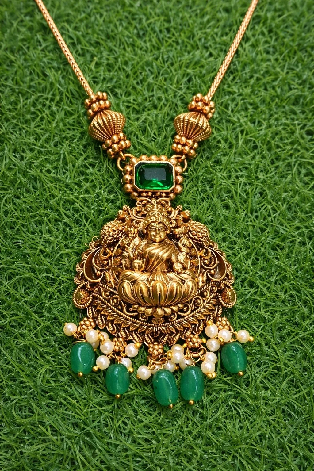 Gold Toned Lakshmi Temple Necklace Set with Green Stones and Pearls