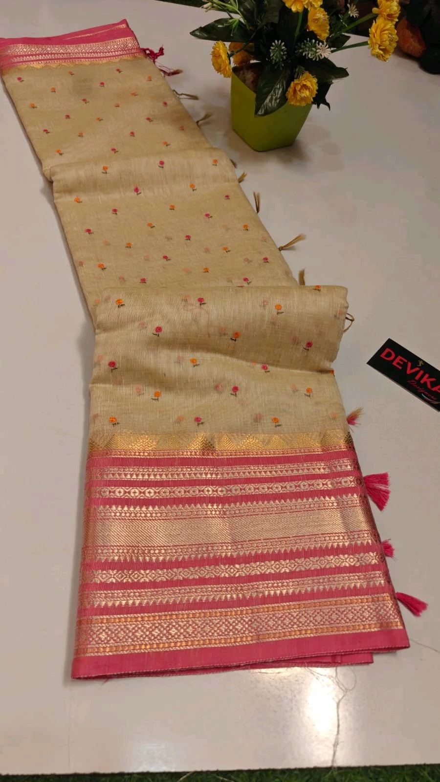 Beige Silk Blend Saree with Pink Zari Border and Floral Motifs thumbnail 1