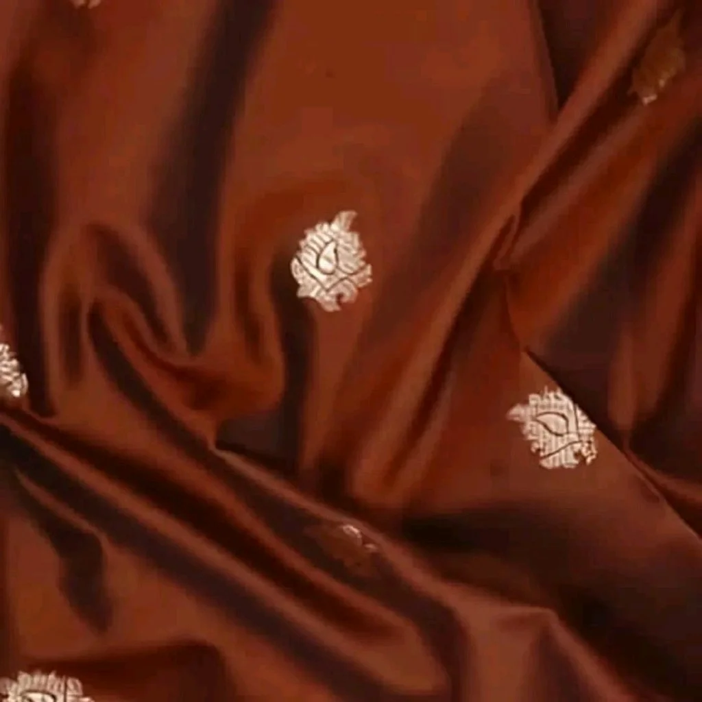 Orange Kanchipuram Silk Saree with Purple Border and Gold Zari Work 2
