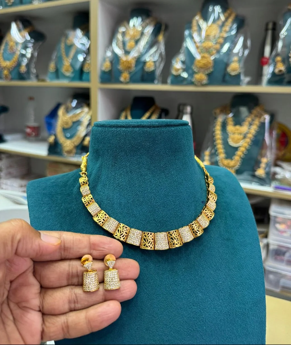 Gold Toned Contemporary Necklace Set with White Stones